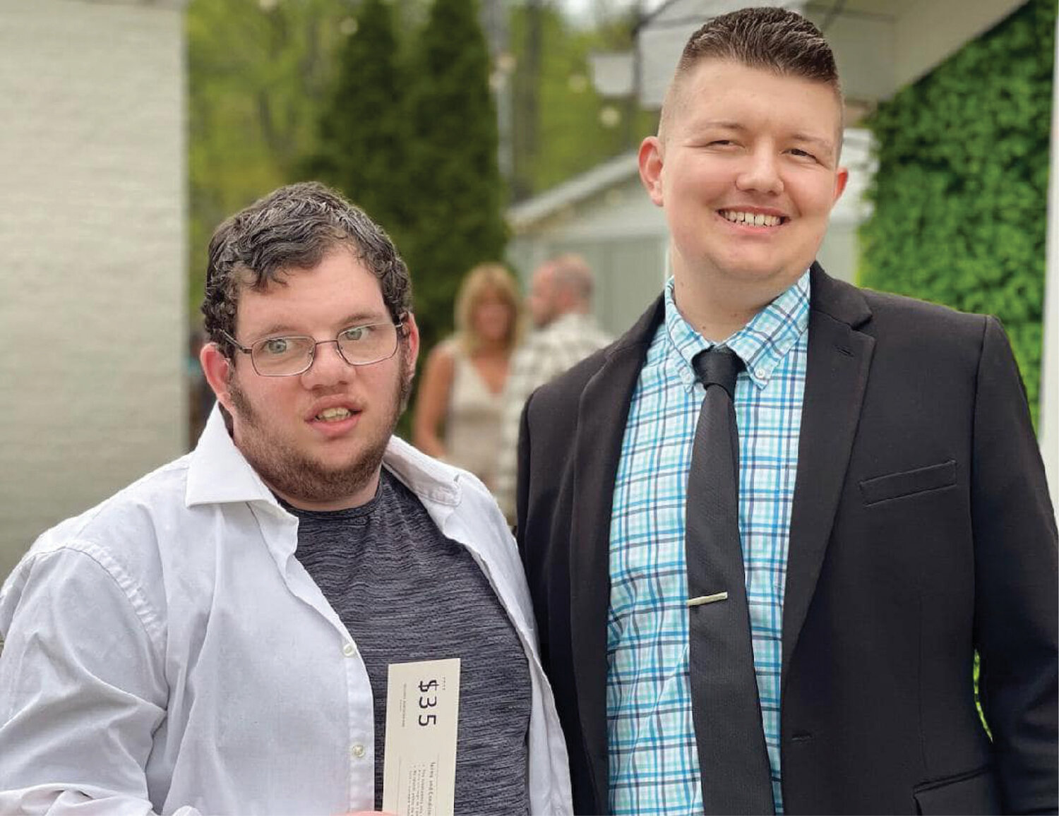 L-R: Jeremy Parrish and Lucas Haston are excited about attending the YMCA fundraising banquet. Thanks to the philanthropy of Bill Johnson and his family, as well as other donors, Jeremy and Lucas are provided with the opportunities to participate in several programs at the Y.